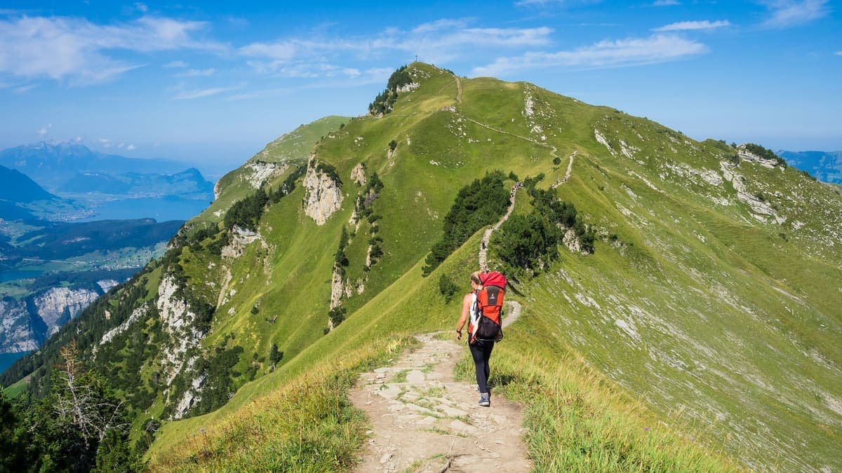 A hiker on a ridgeline trail