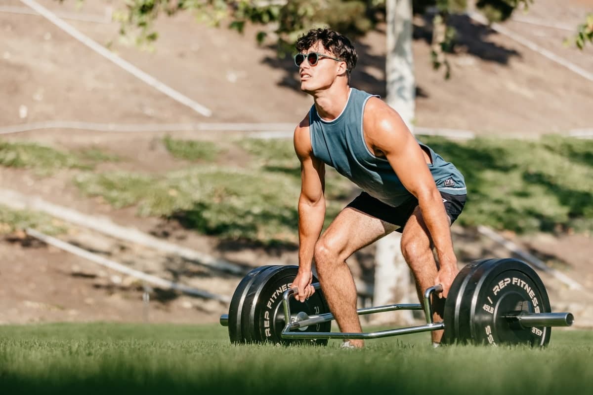 A deadlift bar loaded with plates